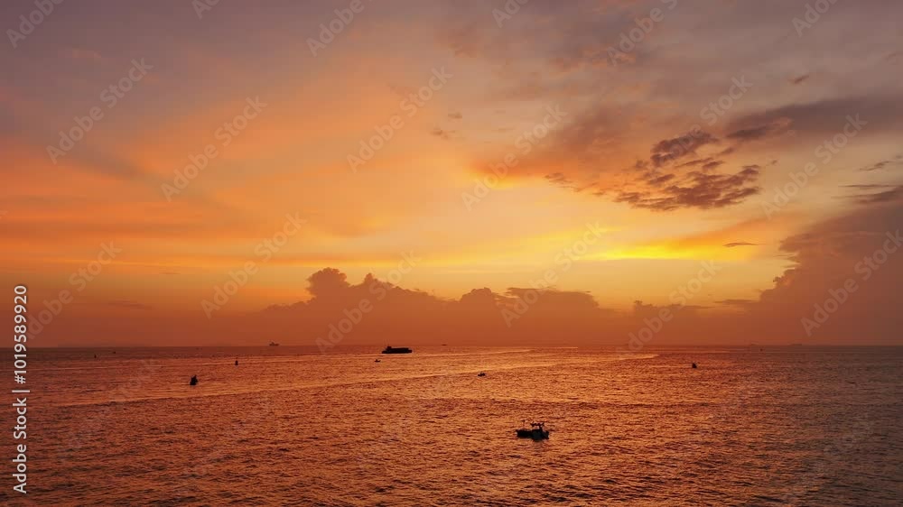 4k Colorful sunset at the sea. Romantic Sunet go down, blue and orange clouds flow in sky. Majestic summer landscape. Beautiful sky fluffy clouds evening day 4k Colorful sunset at the sea. Romantic Sunet go down, blue and orange clouds flow in sky. Majestic summer landscape. Beautiful sky fluffy clouds evening day