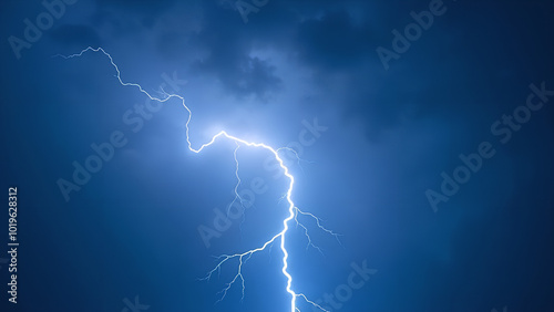 Thunder and lightning on a background with a blue sky Light thunderstorm with strikes in the dark Clouds with a powerful electric charge