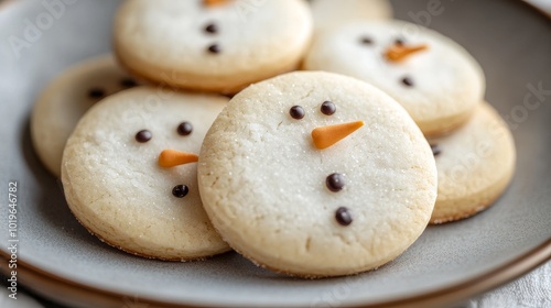 Delightful Snowman Cookies Adorned on a Rustic Plate, Perfect for Winter Festivities and Holiday Gatherings