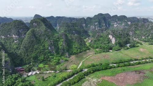 Aerial view of mountains in Tam Coc National Park, Ninh Binh Province - Vietnam. photo