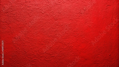 Asymmetrical bright red wall with bold paint texture