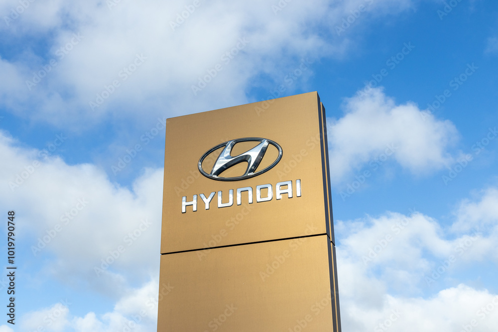 Hyundai logo at the car dealer store in Utrecht. Hyundai, is a South ...