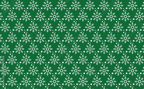 Christmas seamless pattern with snowflakes on green color background . for fabric, wallpaper,paperprint, wrap, backgrounds. photo