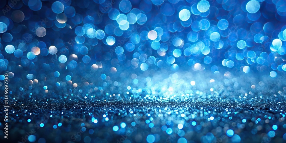 Blue bokeh lights falling on floor creating an elegant abstract background Blue bokeh lights falling on floor creating an elegant abstract background