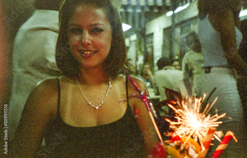 ugc analogical image of a woman having a cocktail outside a cafe