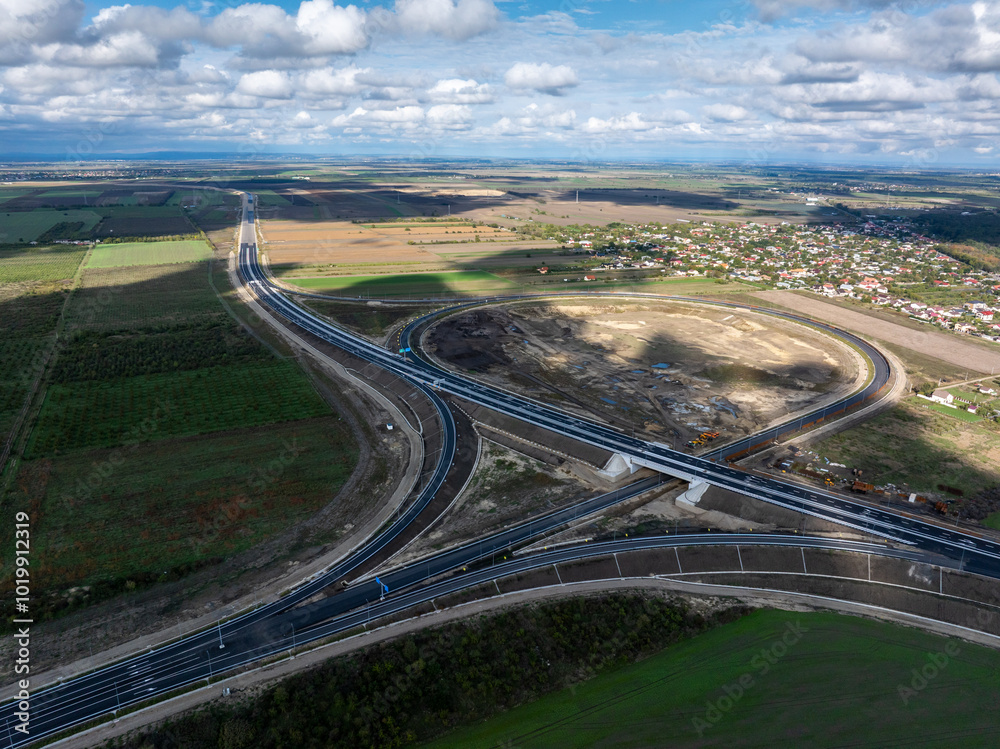 Moldova highway in Romania. A7 highway road from Buzau to Focsani cities. Aerial photo with this high speed road before inauguration. Transportation industry in Romania. Moldova highway in Romania. A7 highway road from Buzau to Focsani cities. Aerial photo with this high speed road before inauguration. Transportation industry in Romania.