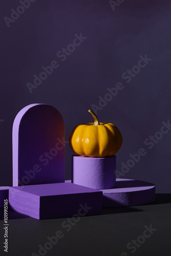 Modern Halloween scene featuring small pumpkins and geometric pu photo