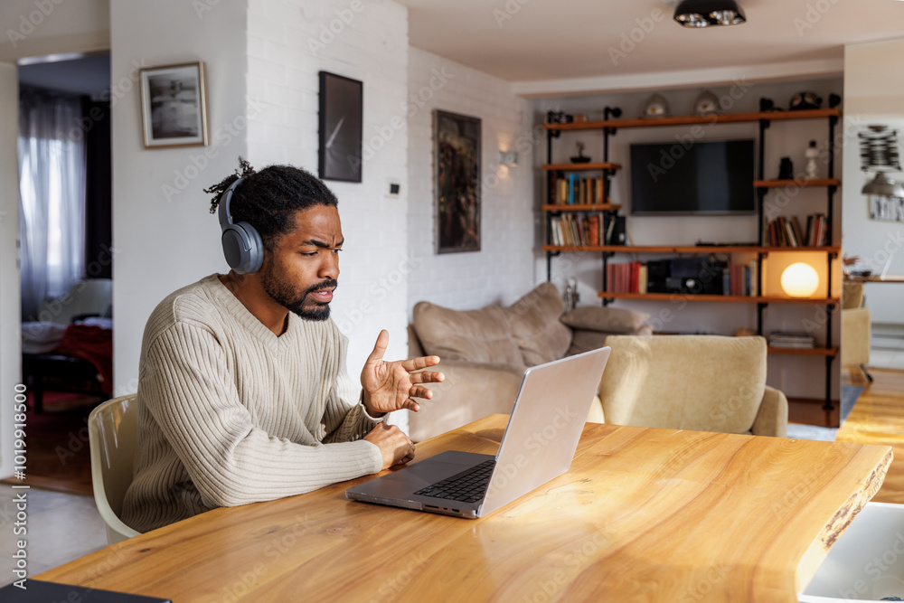 Freelancer discussing on video call at home Freelancer discussing on video call at home