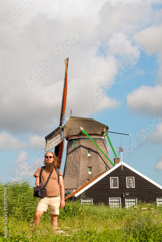 Male tourist in Zaanse Schans, Netherlands photo