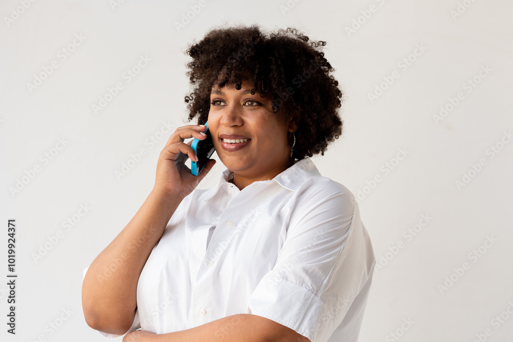 Portrait of a woman talking by phone
