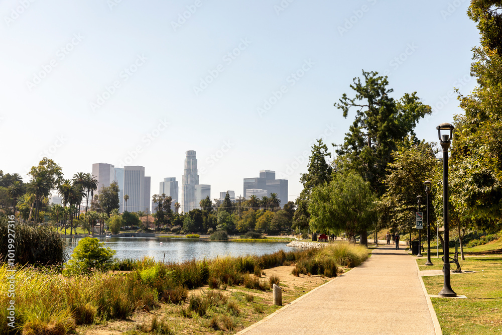 Walking Path at Echo Park Lake with Downtown LA Skyline in the B Walking Path at Echo Park Lake with Downtown LA Skyline in the B