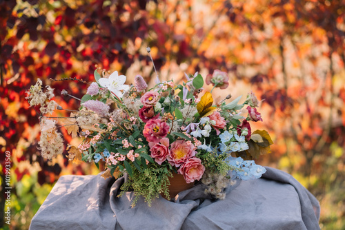 Autumn floral composition with variety flowers out photo