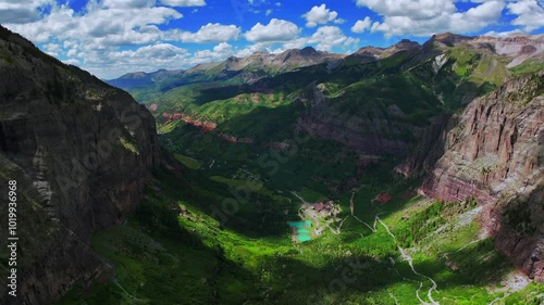 Telluride Box Canyon Colorado Black Bear Pass Road Rocky Mountains 4wd hiking blue sky cliffside valley aerial drone clouds Yankee Boy Basin Ouray Ridgway summer Aspen Forest forward pan up motion photo