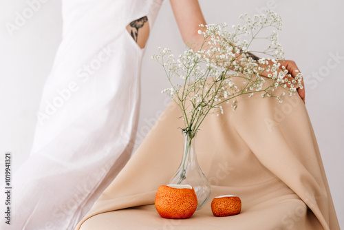 Vase with Flowers and Ceramics photo