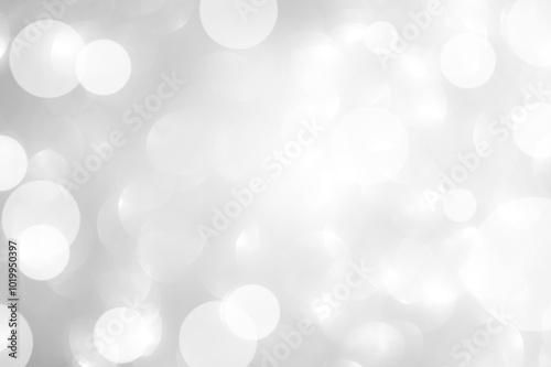 Background grey bokeh abstarct white beige circle light texture bubble blur pattern defocused glowing sparkle snow glitter snowflake magig backdrop ecosystem foreground card silver space decoration. photo