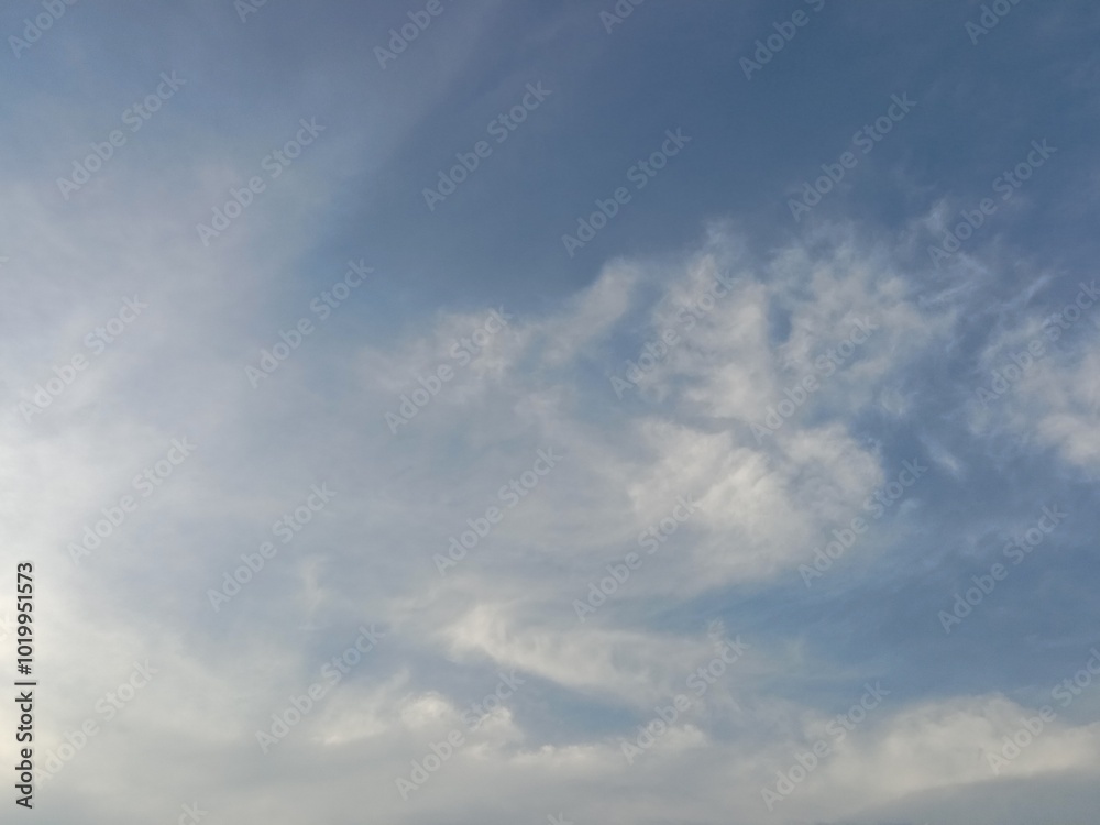 Grey clouds on blue sky in daytime. Cloud background. Presentation. Grey clouds on blue sky in daytime. Cloud background. Presentation.