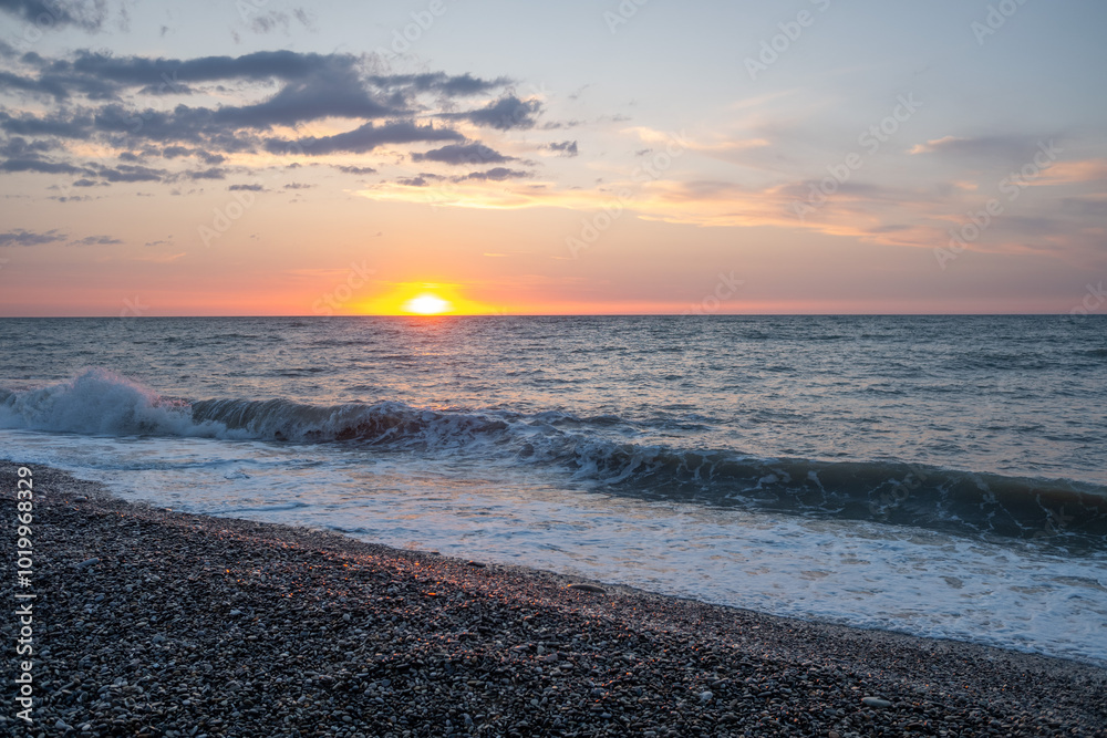 Seashore, small stones, sea wave. Marine background. Seashore, small stones, sea wave. Marine background.