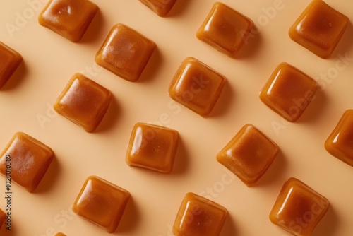 Elegant arrangement of caramel candies on a soft surface showcasing their rich texture