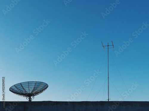 satellite dish on blue sky