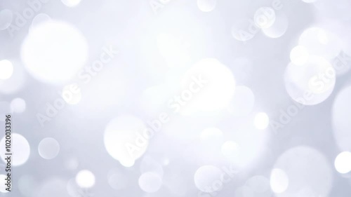 Soft white bokeh lights glowing against a blurred background