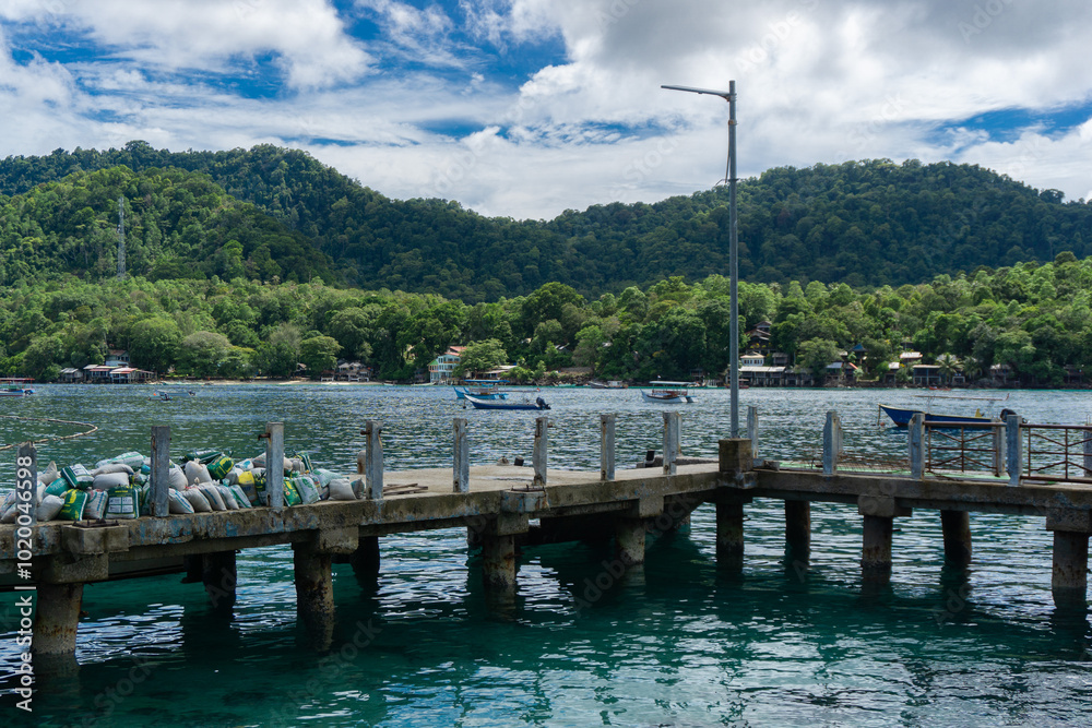 Beautiful landscape of Sabang island with ship and boat dock at the front. Rubiah island harbour in Sumatera, Indonesia. Beautiful landscape of Sabang island with ship and boat dock at the front. Rubiah island harbour in Sumatera, Indonesia.