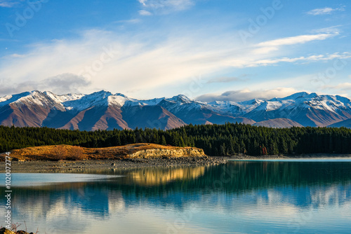 Lake Ruataniwha View Point offers a serene view of the lake and surrounding hills. The calm waters and expansive landscape make it a peaceful retreat for visitors. photo