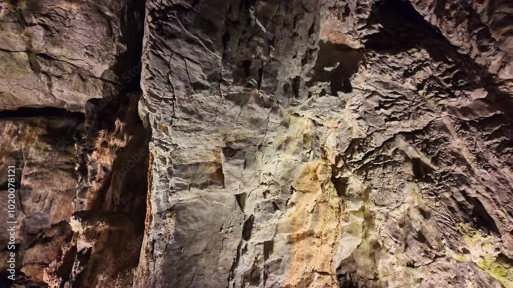 Inside view about wall of the caves of Rochefort with visible geological striations, Mayenne, France. Inside view about wall of the caves of Rochefort with visible geological striations, Mayenne, France.