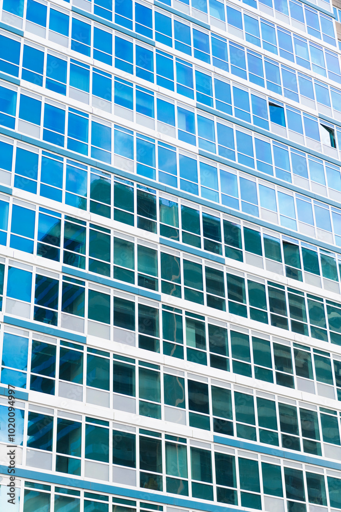 Glass building. Architectural detail. Background of architecture. Modern glass background. Glass facade background. Architecture. Building facade architecture. Building background. Downtown area Glass building. Architectural detail. Background of architecture. Modern glass background. Glass facade background. Architecture. Building facade architecture. Building background. Downtown area