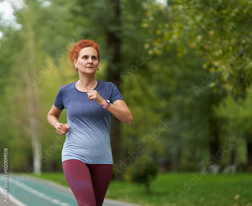 Woman running in park