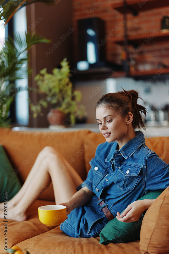 Relaxing Morning Routine Woman Enjoying Breakfast of Cereal and Coffee on a Comfortable Couch Relaxing Morning Routine Woman Enjoying Breakfast of Cereal and Coffee on a Comfortable Couch