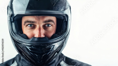 Rider with leather jacket and helmet riding a motorbike on white background looks cool with headlights, safe driving concept on the road