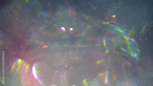Blurred The refraction and reflection of light hitting the glass crystal surface. 