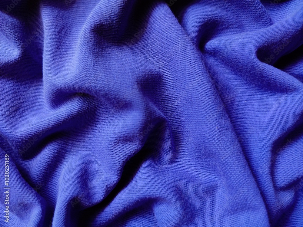 The texture and background of the fabric is blue The texture and background of the fabric is blue