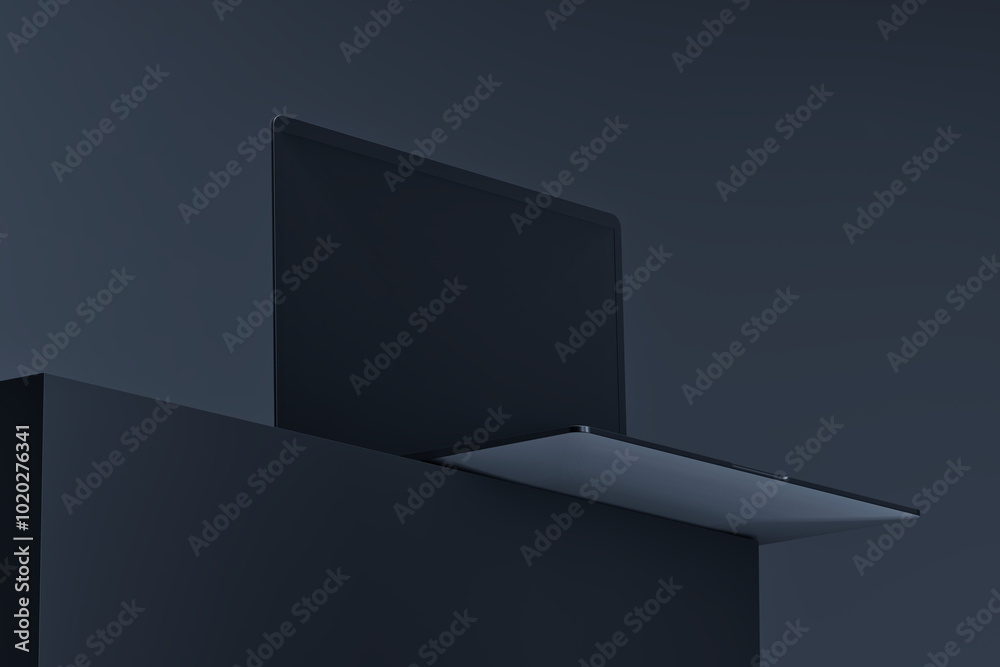 Fototapeta premium Sleek Laptop on Dark Minimalist Background 