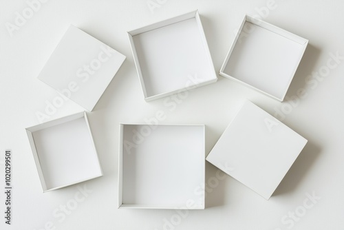 Wallpaper Mural Group of white square boxes with lids, some open, some closed, isolated on white, great for product packaging ads, e-commerce branding, or storage concepts Torontodigital.ca