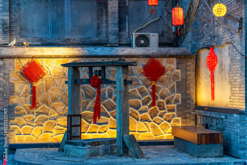 Beijing Hutong decoration during Chinese new year Spring Festival, ancient well photo