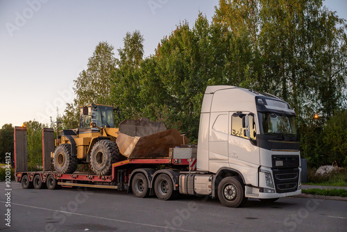 Wall Mural Heavy-Duty truck transporting agricultural farm tractor