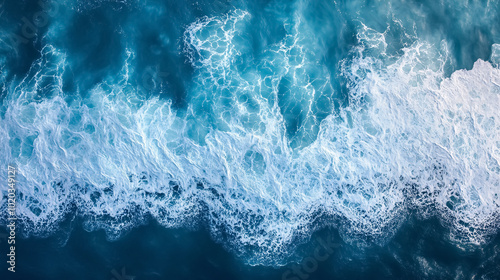Aerial View of Ocean Waves: A top-down view of ocean waves, highlighting the patterns and movement of the sea from above.