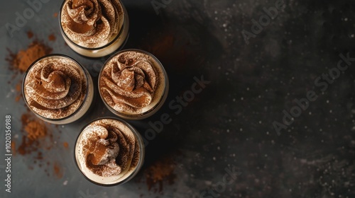 Elegant Tiramisu Desserts in Glasses on Dark Grey Background