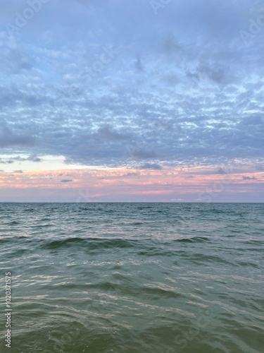 Pink sunset on the horizon of an Australian shoreline