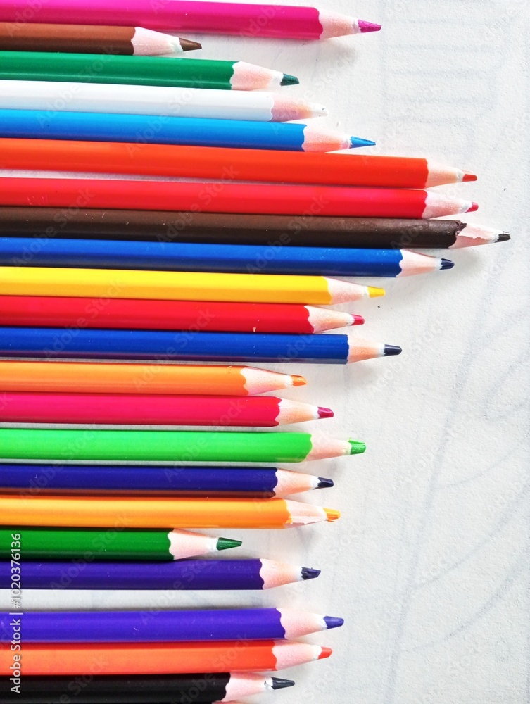 Fototapeta premium Colored pencils isolated on white background. Close up, selective focus.