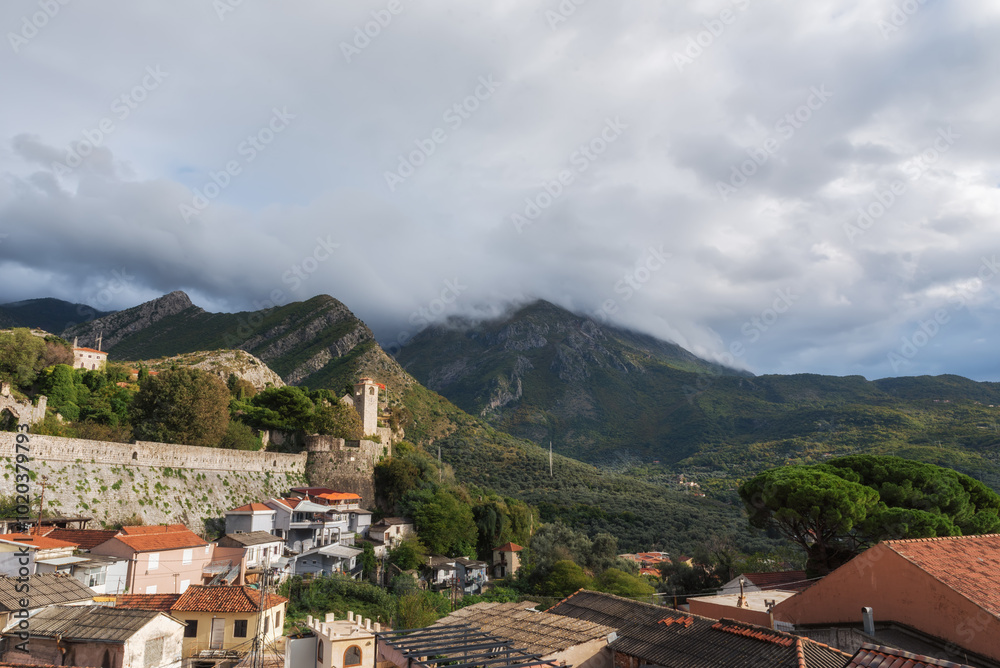 Fototapeta premium Roofs of the Town Old Bar in Montenegro. Walls of the medieval fortress on the background at the foot of Mount Rumia