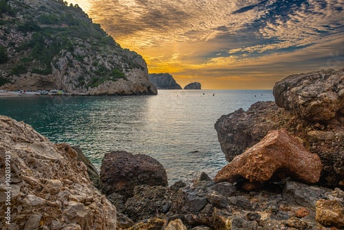 The Granadella cove with crystal-clear waters in Javea, Alicante, in the Spanish Mediterranean photo