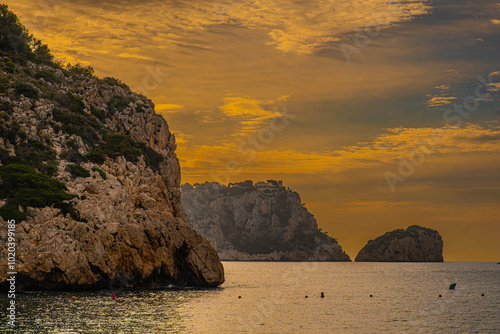 The Granadella cove with crystal-clear waters in Javea, Alicante, in the Spanish Mediterranean photo