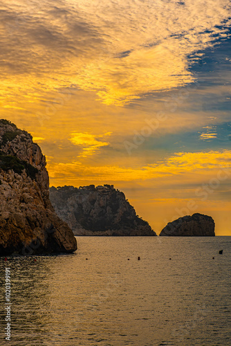 The Granadella cove with crystal-clear waters in Javea, Alicante, in the Spanish Mediterranean