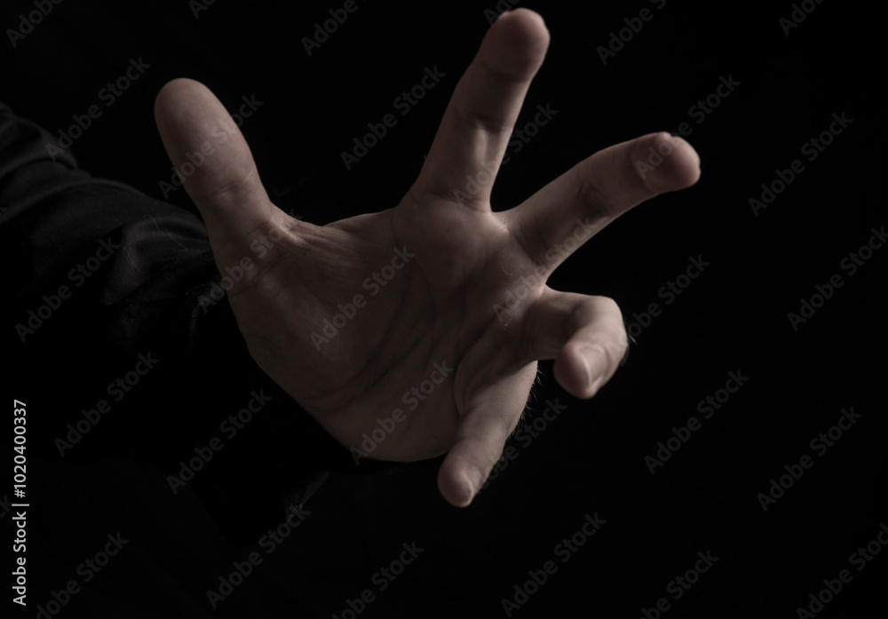 Man hand dark background. Man hand dark. Background. Male. Photo. Model. Finger. Man hand dark background. Man hand dark. Background. Male. Photo. Model. Finger.