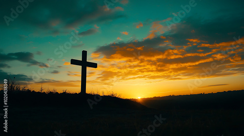 A powerful silhouette of a cross set against the backdrop of a vibrant sunrise. The orange and blue tones in the sky create a peaceful and spiritual atmosphere, symbolizing faith, hope, and serenity. photo