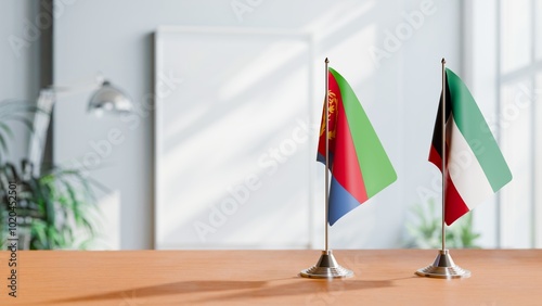 FLAGS OF ERITREA AND KUWAIT ON TABLE