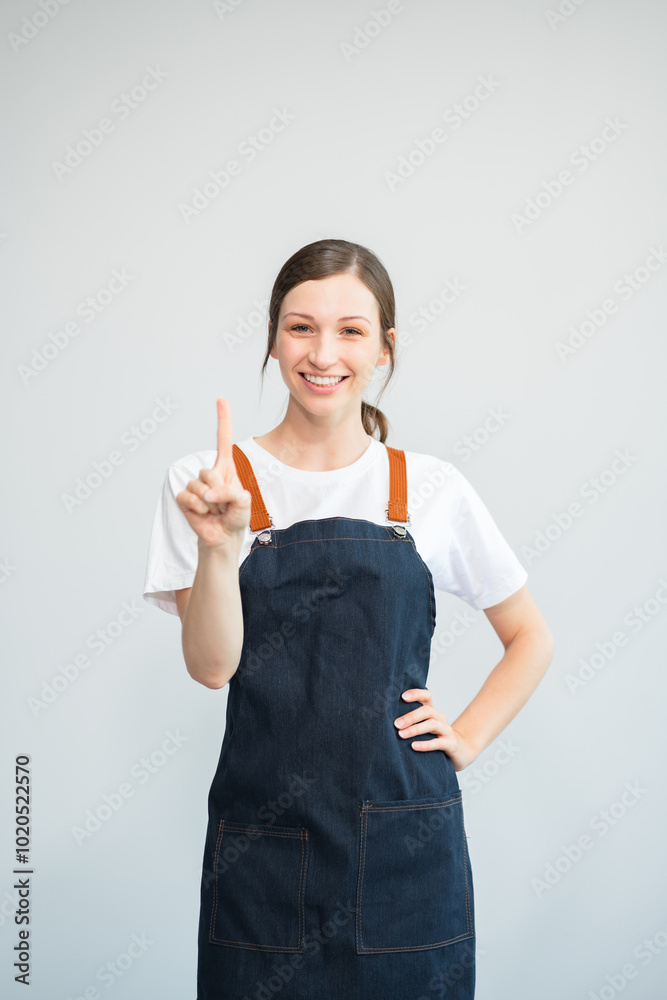 caucasian businesswoman smiling and pointing to empty copy space isolated on white background. caucasian businesswoman smiling and pointing to empty copy space isolated on white background.