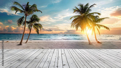 Tropical sunset on the beach with palm trees and trees in the background